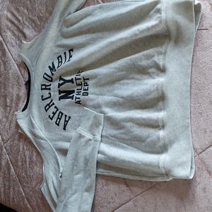 Long sleeve shirt with holes in shoulder(on purpose)